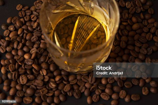 Coffee Beans And Cognac In Middle Closeup Stock Photo - Download Image Now - Alcohol - Drink, Alcohol Abuse, Anise