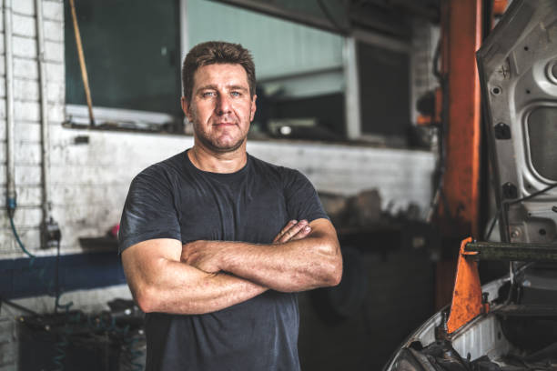 Auto Service Worker/Owner Portrait arms crossed stock pictures, royalty-free photos & images