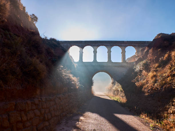 istock Ancient aqueduct on a road in Teruel 931921224