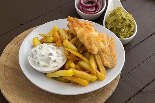 The fish and chips. A traditional English dish.\