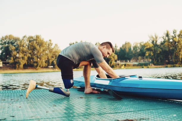 istock Courageous amputee sportsman with kayak 931925648