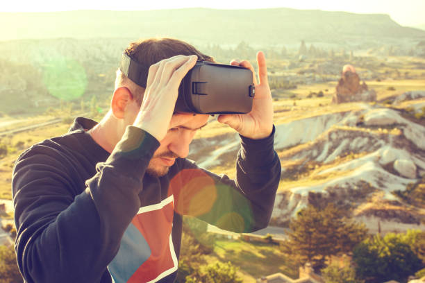 istock The man with glasses of virtual reality. Future technology concept. Modern imaging technology. 931929156