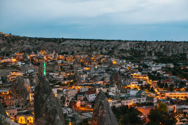 istock Top view. A small authentic city called Goreme in Cappadocia in Turkey in the evening. Dramatic night sky, sunset. 931929870