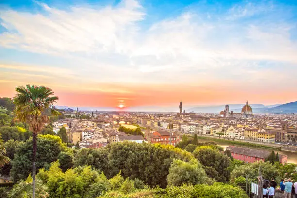 incredibly beautiful magic panoramic view of Florence from Michelangelo Square at sunset. It is a pilgrimage of tourists and romantics. Duomo Cathedral. Italy, Tuscany