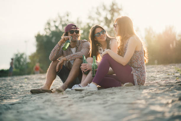 istock Fun with friends on summer beach gathering 931934314