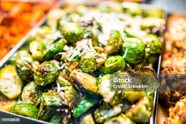 Macro Closeup Of Roasted Green Brussels Sprouts Cabbage In Tray On Display In Buffet Catering Deli Store Shop Grocery Market Fresh Cheese Stock Photo - Download Image Now