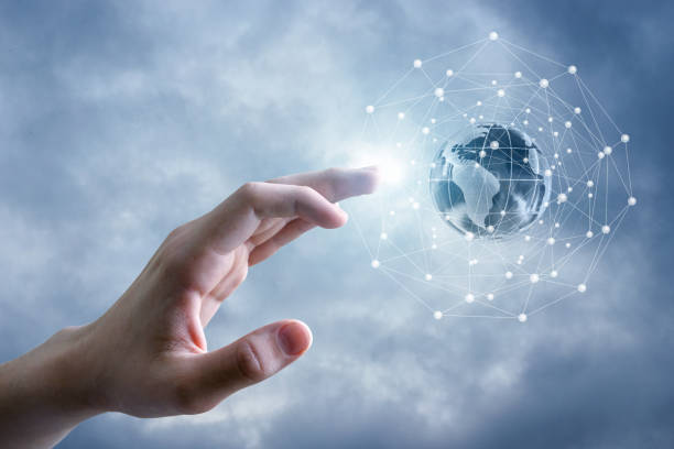 istock The global network and the hand. 931938840