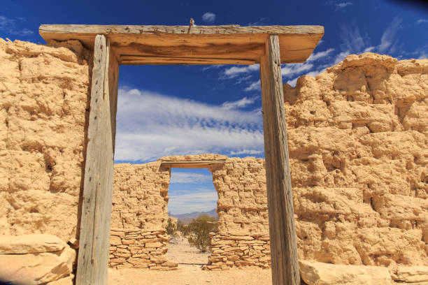 Terlingua, Texas, just outside of Big Bend National Park has  ruins with mountains in the back ground.