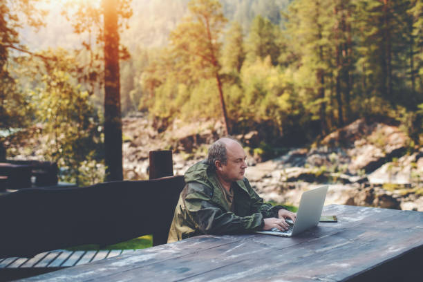 istock Businessman with netbook during his vacations 931941192
