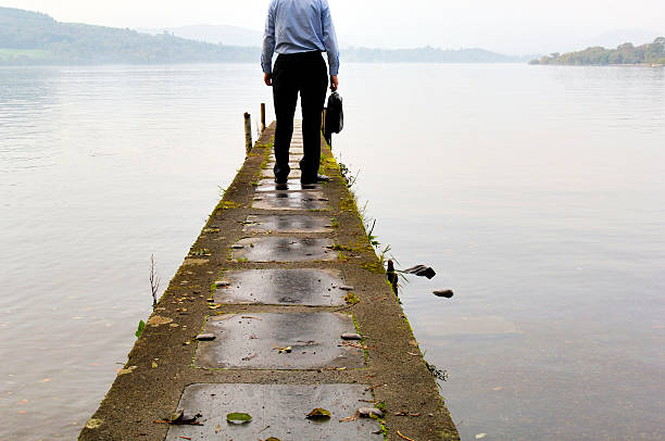 businessman lakeside, contemplating?