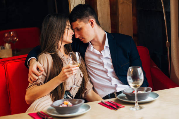 istock Happy young couple taking selfie with smart phone at cafe 931947396