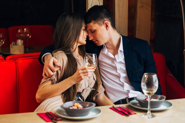 istock Happy young couple taking selfie with smart phone at cafe 931947424