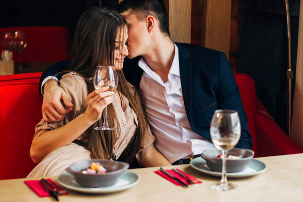 istock Happy young couple taking selfie with smart phone at cafe 931947440