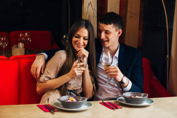 istock Happy young couple taking selfie with smart phone at cafe 931947482