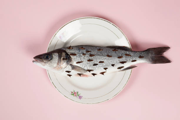 istock fish pink plate rosebush thorns 931947502