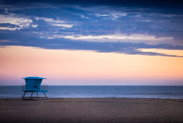 Clouds roll in over Huntington Beach, California during a beautiful Southern California sunset.