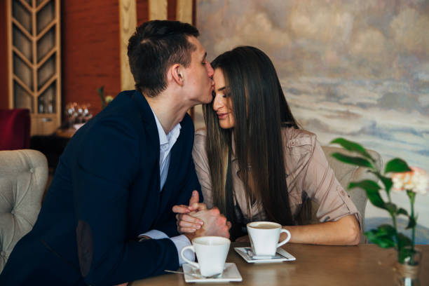 istock Happy young couple taking selfie with smart phone at cafe 931948042