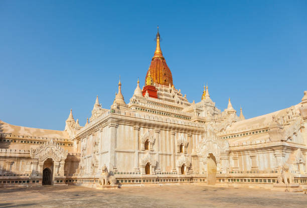 Ananda Temple in  Old Bagan, Myanmar. The Buddhist temple houses four standing Buddhas, each one facing the cardinal direction of East, North, West and South. bagan archaeological zone stock pictures, royalty-free photos & images