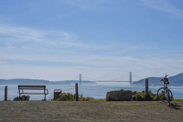 Golden Gate Bridge from Angel Island A bicycle and a bench at an overlook on Angel Island with a view of the Golden Gate Bridge. low viewing point stock pictures, royalty-free photos & images