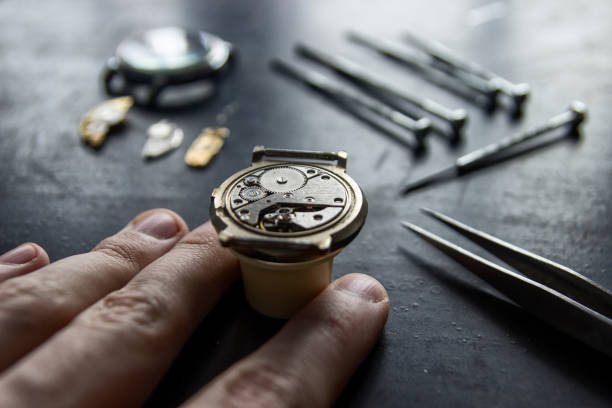 istock Process of installing a part on a mechanical watch, watch repair 931952230