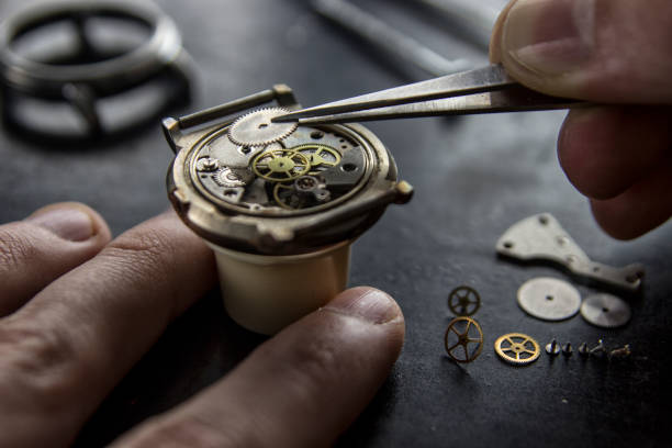 istock Process of installing a part on a mechanical watch, watch repair 931957158