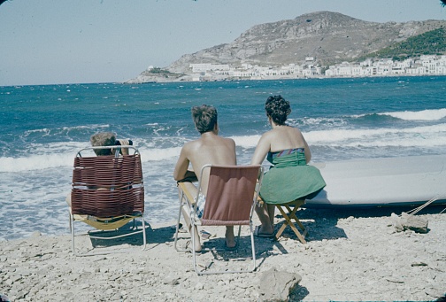 Spain, 1965. Holidaymakers on the beach look at the sea (exact location unfortunately unknown).
