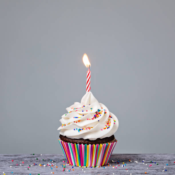 birthday cupcake with red candle - cupcake cake birthday candy imagens e fotografias de stock