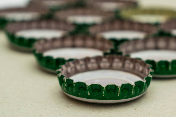 Different bottle caps on a gray background