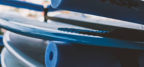 istock All sizes surfboards close-up. Surf camp and boards of different sizes for surfing 931965038