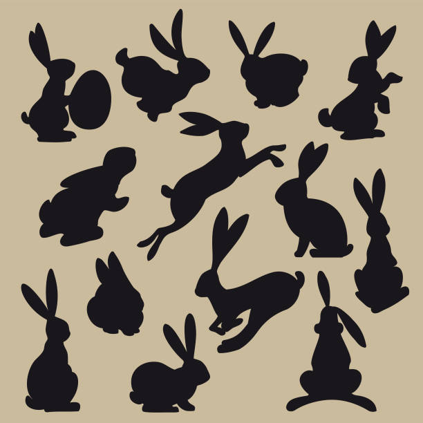 Collection of black easter rabbit silhouettes Vector illustration of various bunny poses. easter silhouettes stock illustrations