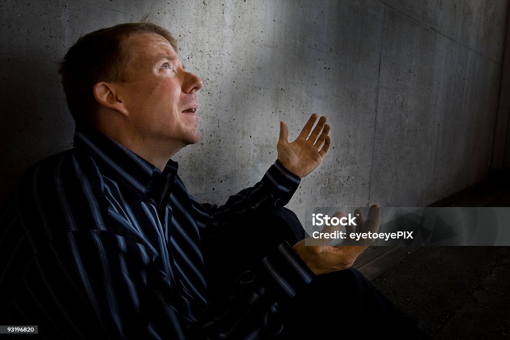 Man calling out “Why”?  God Stock Photo