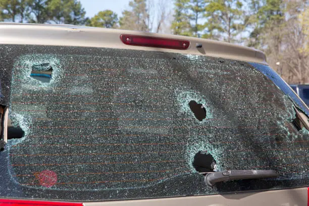Hail damage or wrecked broken back auto glass shattered needs repair