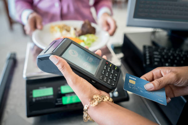 istock Paying by credit card at a self-service restaurant 931994102