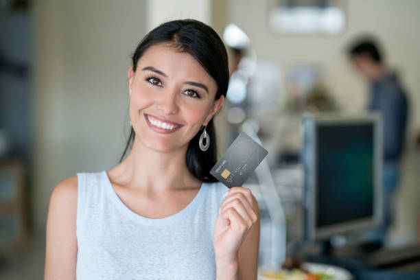 istock Woman paying by credit card at a self-service restaurant 931994196