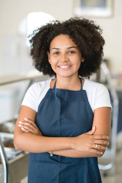istock Portrait of a happy waitress working at a restaurant 931994230