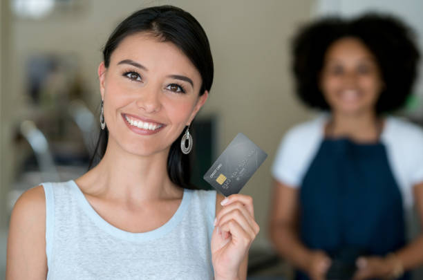 istock Woman paying by credit card at a self-service restaurant 931994262