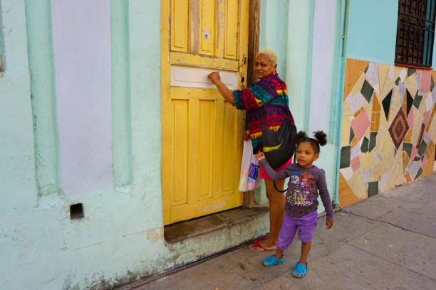 Havana Streets /Cuba - January 20, 2018: The streets of Havana is full of interesting people and old American cars for the photographers at Cuba