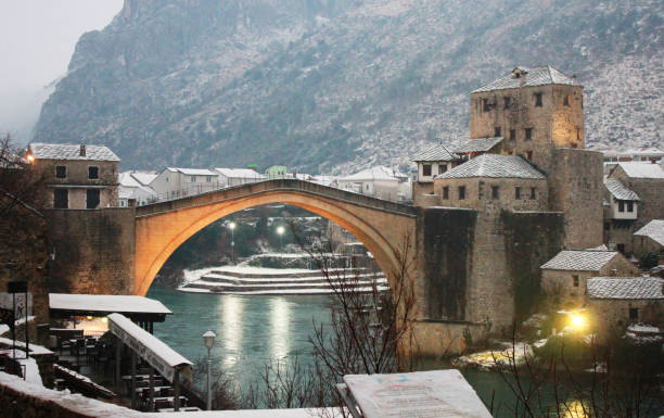 Mostar bridge in Bosnia and Herzegovina in winter. Mostar bridge in Bosnia and Herzegovina in winter. The Neretva river. Old bridge stari most mostar stock pictures, royalty-free photos & images
