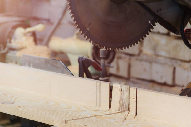 istock Workshop of Cabinetmaker Carpenter - Working with Wood. Electric Backsaw with Copyspace. 932022106