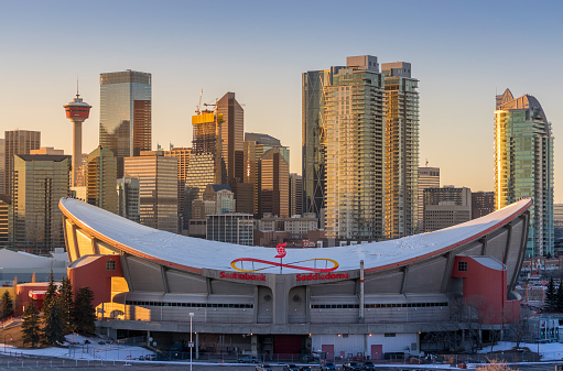 CALGARY, Canada - March 12. 2018: View of Calgaryskyline and Scotiabank Saddledome in the evening