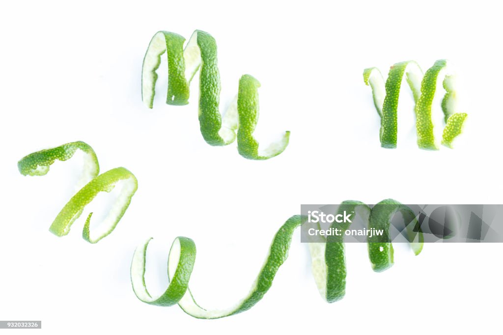 green lemon twist on white background Orange Color Stock Photo