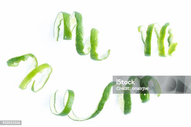 Green Lemon Twist On White Background Stock Photo - Download Image Now - Orange Color, Twisted, Fruit