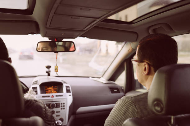 istock Friends enjoying the drive 932032584