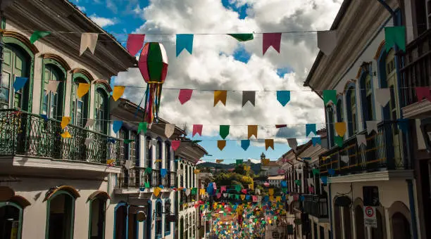 In Brazil, costume of orment streets and cities for june party are traditional. These partys are characterized by music, dance, typical food and drink, attracting tourists of all world. In image, the famous city of Ouro Preto.