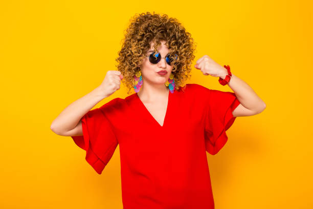 istock Attractive woman with short curly hair 932051516
