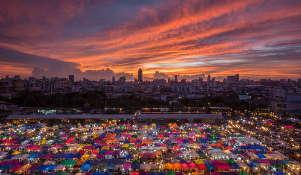 istock A colourful night market with beutiful sky 932063954
