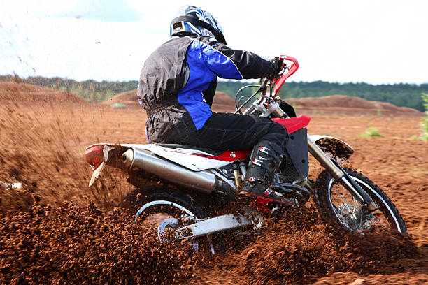 istock Off-road motorbike cornering in dirt 93206533