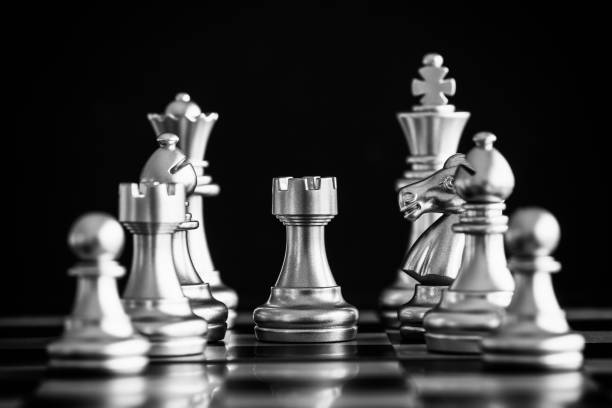 istock Strategy chess battle Intelligence challenge game on chessboard. Success the strategy concept. Chess business leader and success idea. Chess strategy game business competition success play. 932081440