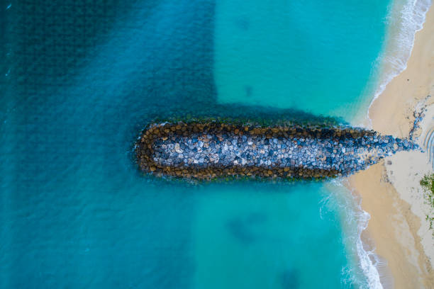 istock Breakwater and beautiful sea. 932084980