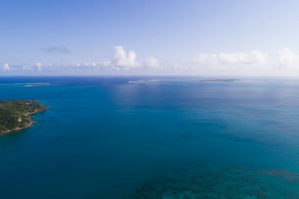 istock Blue sky and white clouds, and wide ocean. 932085698